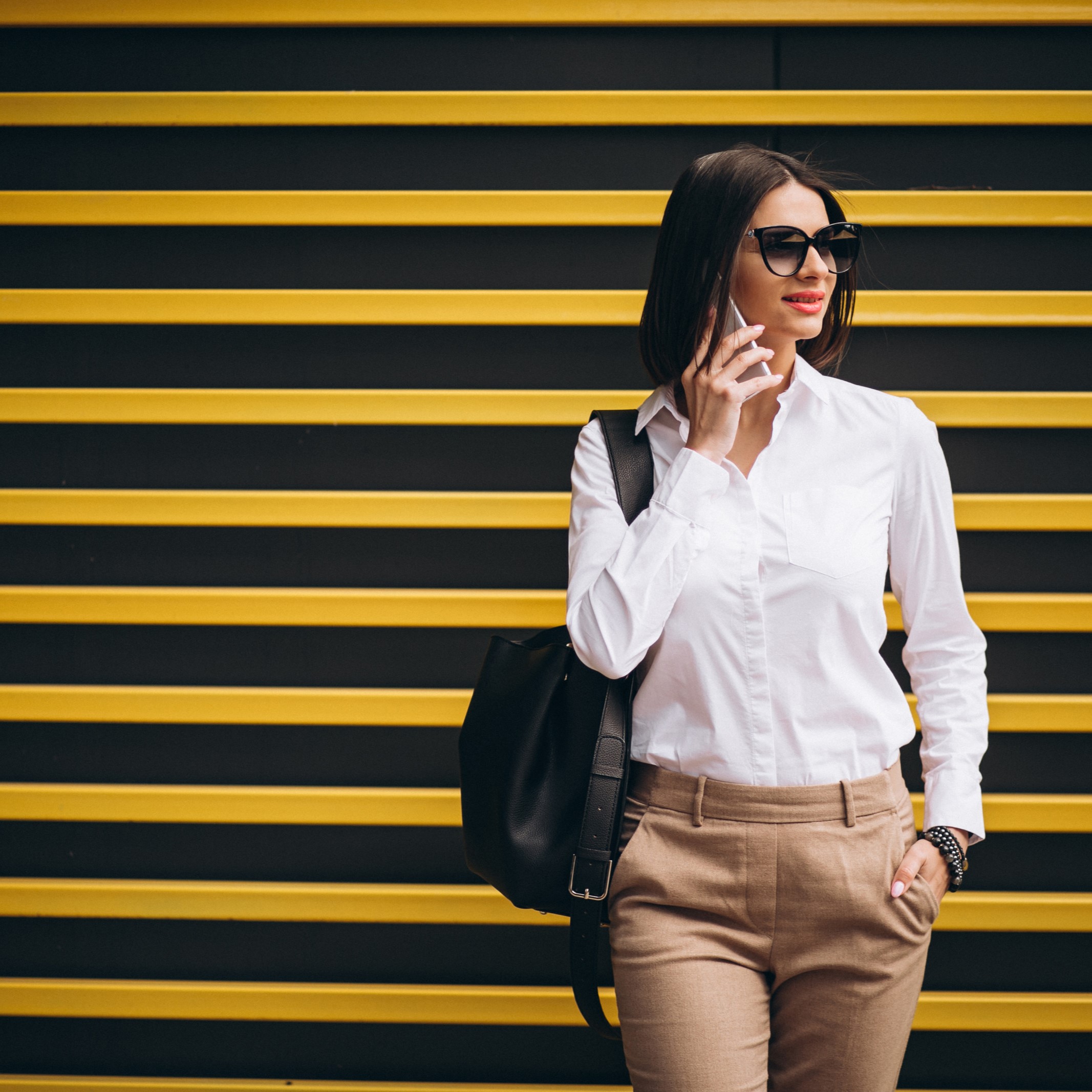 A venture capital investor takes a phone call