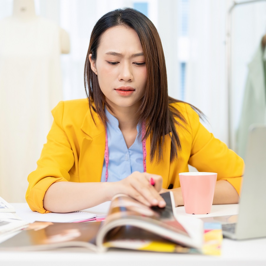 A business owner reviews her financials