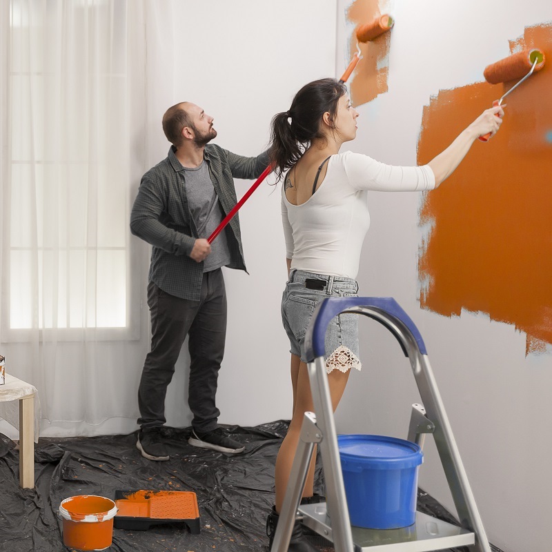 Couple repaints room after securing loan