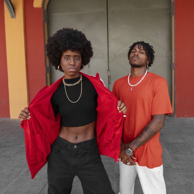 A couple model luxury street wear at Cannes