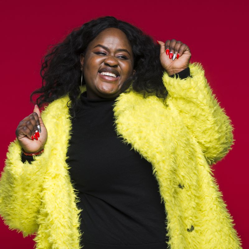 A stylish woman celebrates