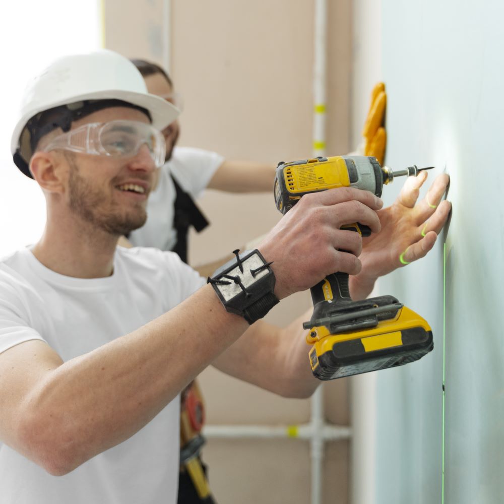 A handyman at work on a building project