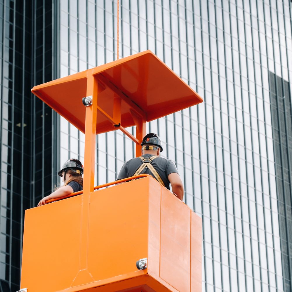 Construction workers restructuring a project and their debt