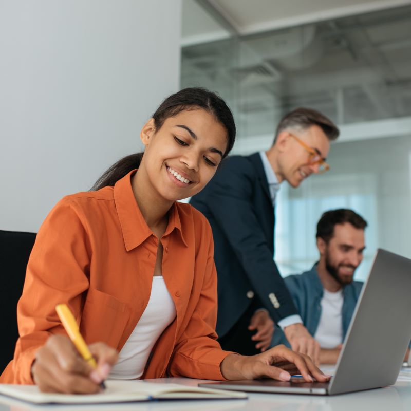 A business team work together to address funding challenges