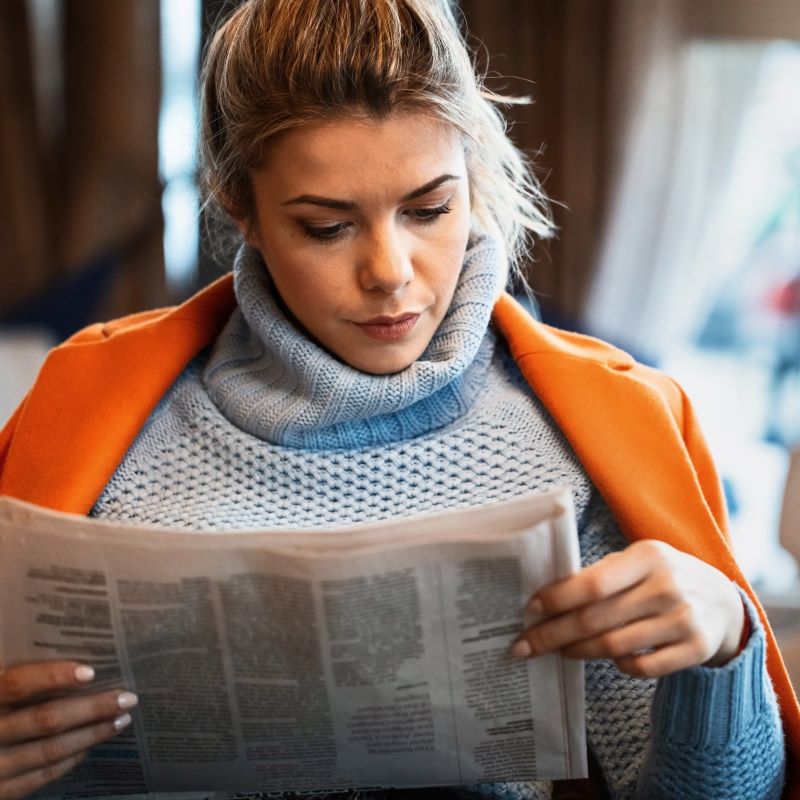 A business owner checks interest rates