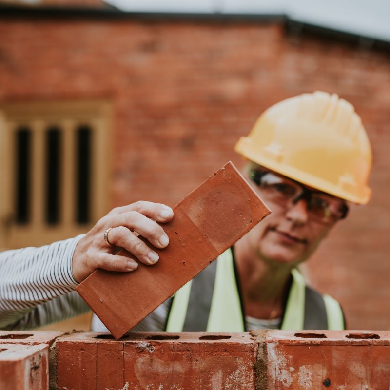 A woman builds her constructions business one brick at a time.