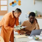A business owner and her CFO review their financials